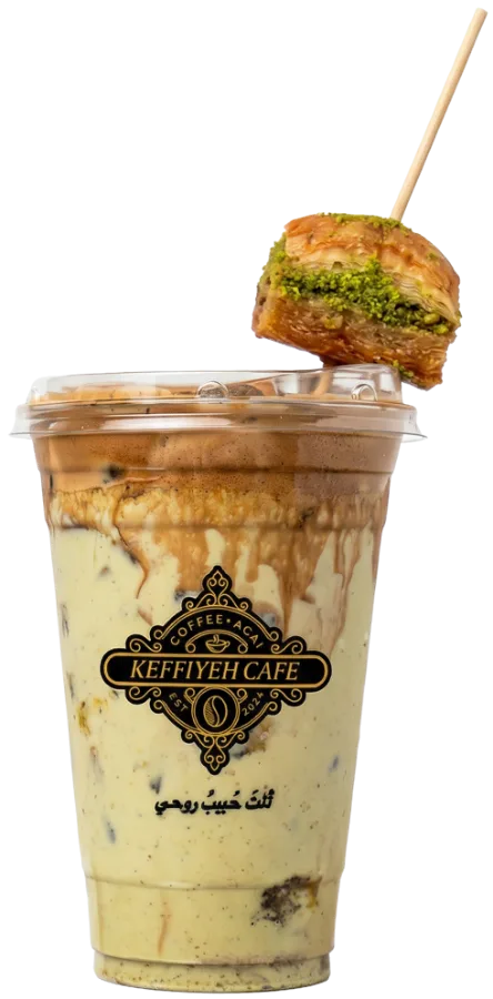 Iced baklava latte with baklava on a skewer